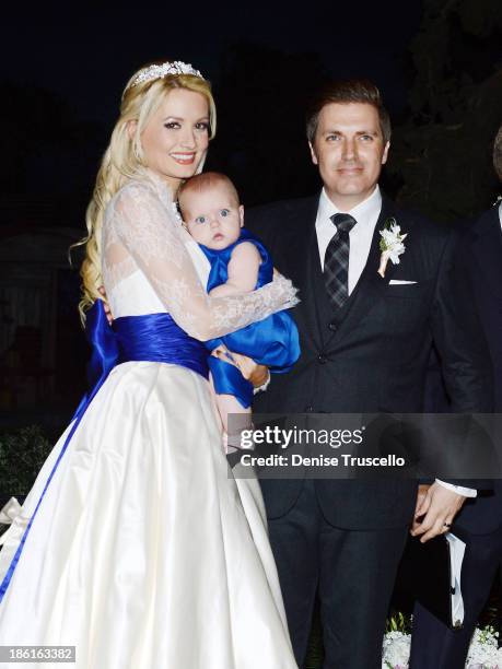 Holly Madison, Rainbow Rotella and Pasquale Rotella pose for photos after Holly and Pasquale's wedding ceremony at Disneyland on September 10, 2013...