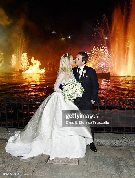 Holly Madison and Pasquale Rotella during their wedding reception at Disneyland on September 10, 2013 in Anaheim, California.