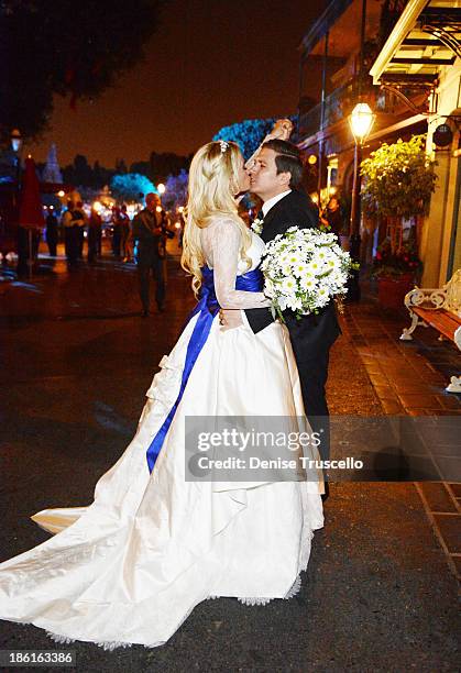 Holly Madison and Pasquale Rotella during their wedding reception at Disneyland on September 10, 2013 in Anaheim, California.