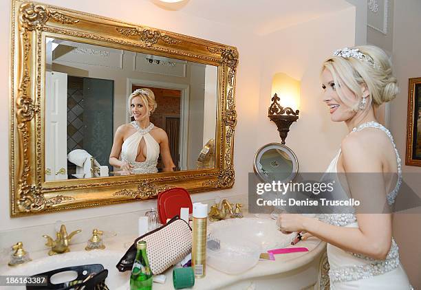 Holly Madison gets ready for her wedding reception at Disneyland on September 10, 2013 in Anaheim, California.