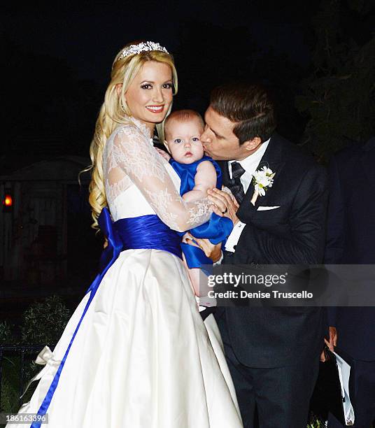 Holly Madison, Rainbow Rotella and Pasquale Rotella pose for photos after Holly and Pasquale's wedding ceremony at Disneyland on September 10, 2013...