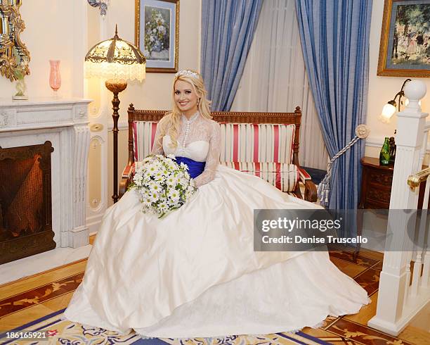 Holly Madison poses for photos before her wedding at Disneyland on September 10, 2013 in Anaheim, California.