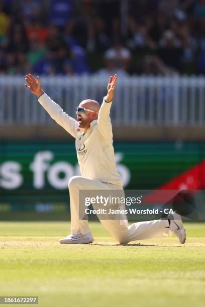 Nathan Lyon of Australia appeals for his 500th wicket during day four of the Men's First Test match between Australia and Pakistan at Optus Stadium...