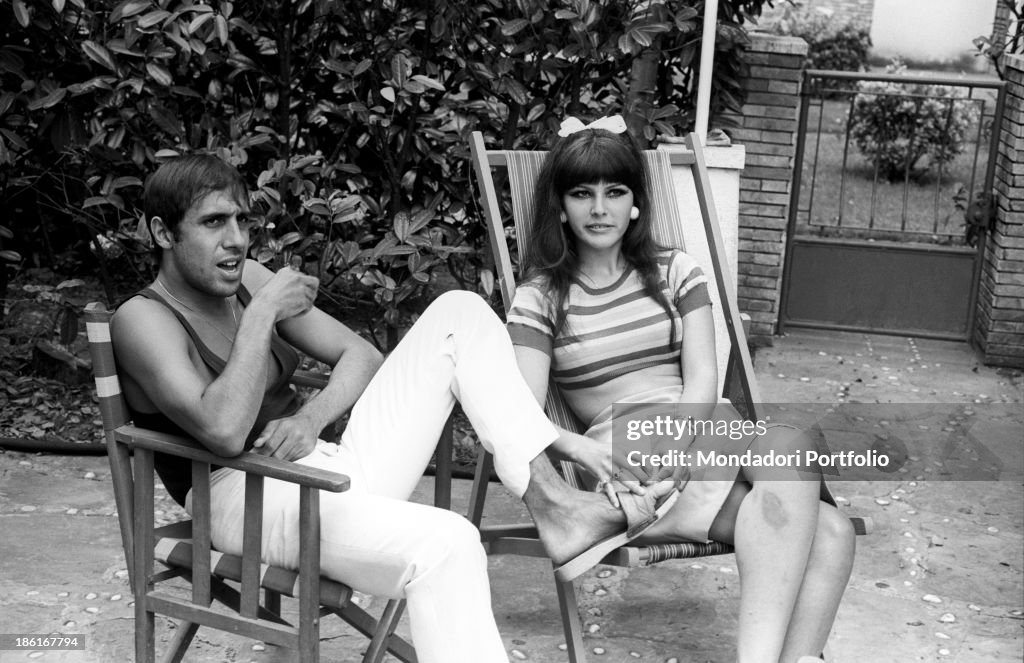 Adriano Celentano and Claudia Mori having a rest