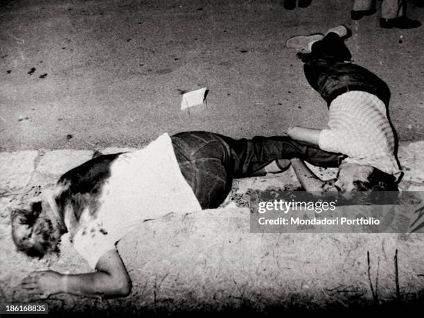 The bodies of Carabinieri lieutenant-colonel Giuseppe Russo and his friend Filippo Costa lying dead. The men were killed during a Mafia attack...