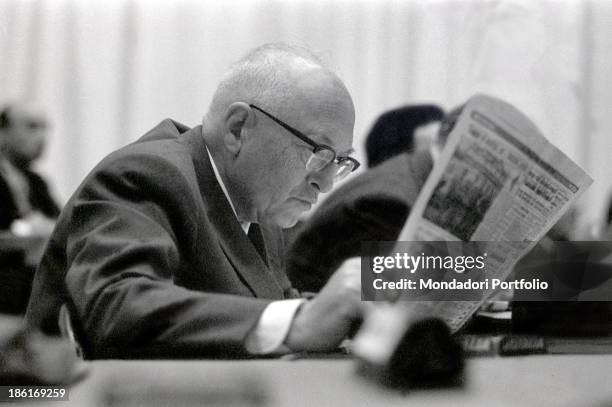 Italian politician Pietro Nenni reading a newspaper at the congress of the Italian Socialist Party at the Teatro Lirico. Milan, 1962.