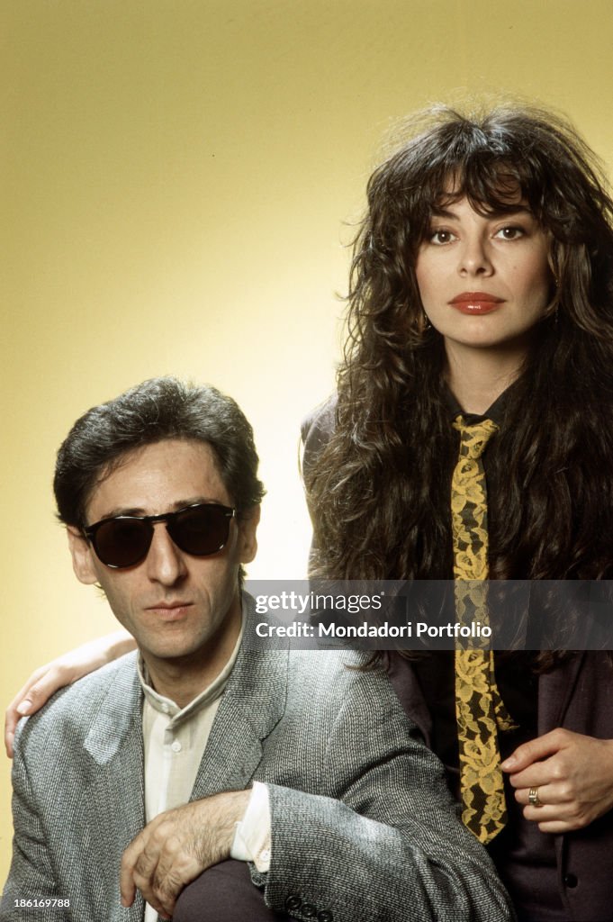 Portrait of Franco Battiato and Alice wearing a tie
