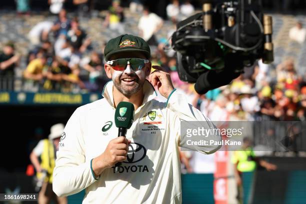 Nathan Lyon of Australia is is interviewed after taking his 500th test wicket after Australia claimed victory during day four of the Men's First Test...