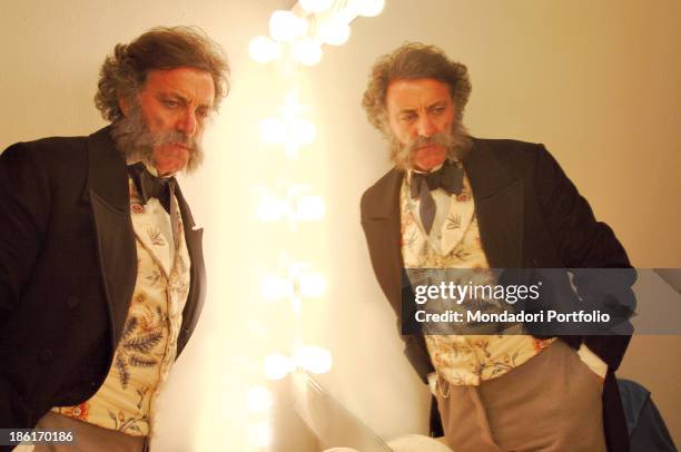 Italian actor and director Luca Barbareschi standing in the dressing room of the Apollonio Theatre in Varese waiting for playing the prince Fabrizio...