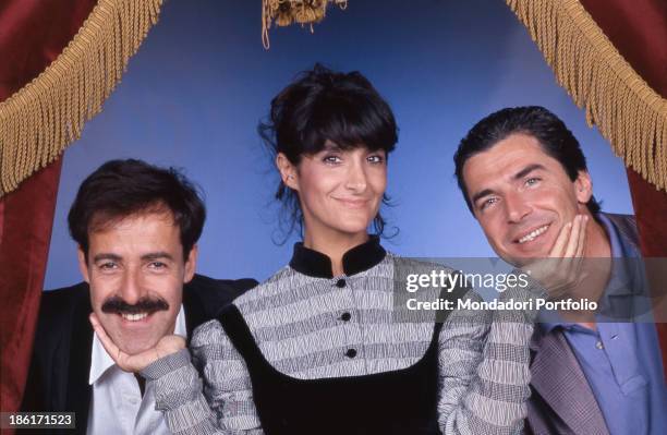 Italian actors and comedians Massimo Lopez, Tullio Solenghi and Anna Marchesini smiling. The comedians form the comic group called Trio. Italy, 1989.