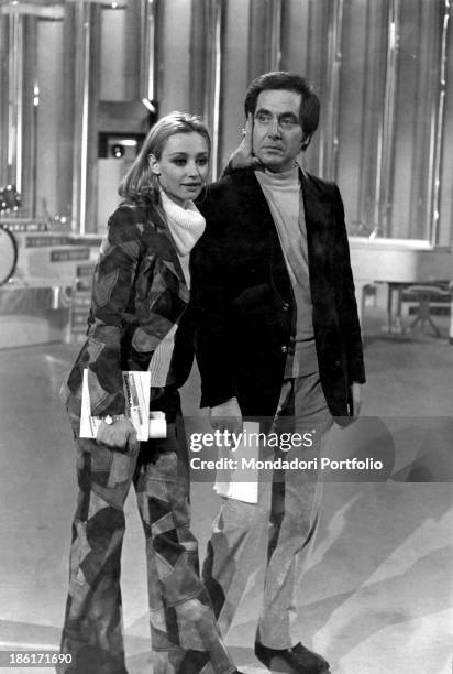 Italian television and radio presenter and writer Corrado and Italian TV presenter and showgirl Raffaella Carrà hosting the TV show Canzonissima....