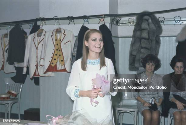 Italian singer Anna Identici smiling in the dresssing room of the 18th Sanremo Music Festival. Sanremo, February 1968.