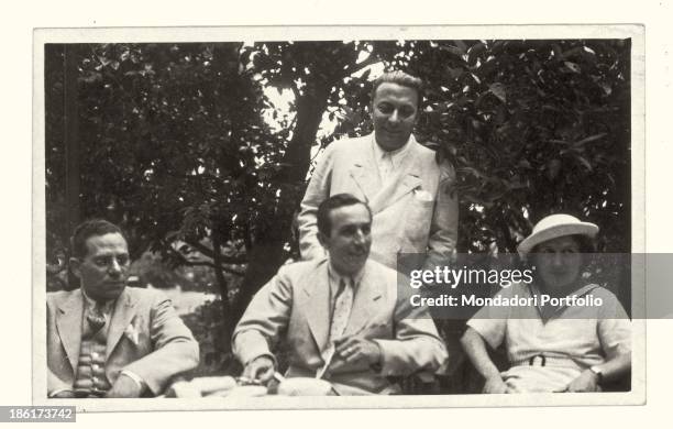 Arnoldo Mondadori and Walt Disney with George Kamen. Meina, 14 July 1935.