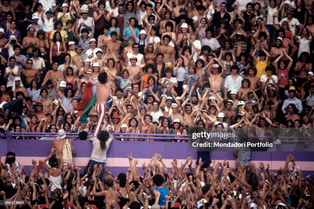 Mick Jagger amongst his fans at a Rolling Stones concert in Turin