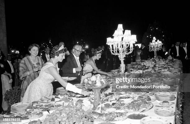 Italian politician and President of the Italian Republic Giovanni Gronchi, Her Imperial Highness Princess Soraya of Iran and the princess Shahnaz...