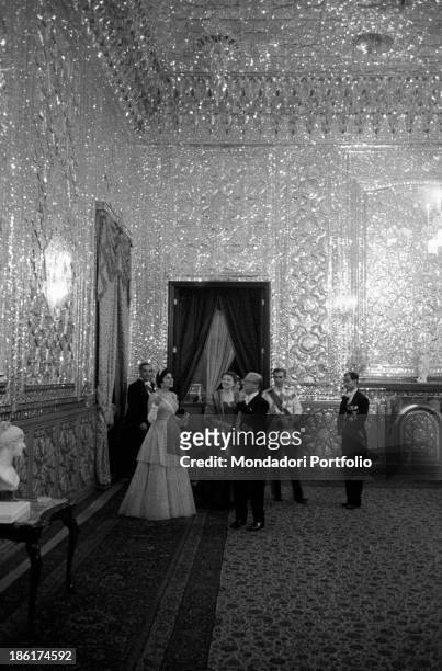 Italian politician and President of the Italian Republic Giovanni Gronchi, his wife Carla, the Shah Mohammad Reza Pahlavi and Her Imperial Highness...
