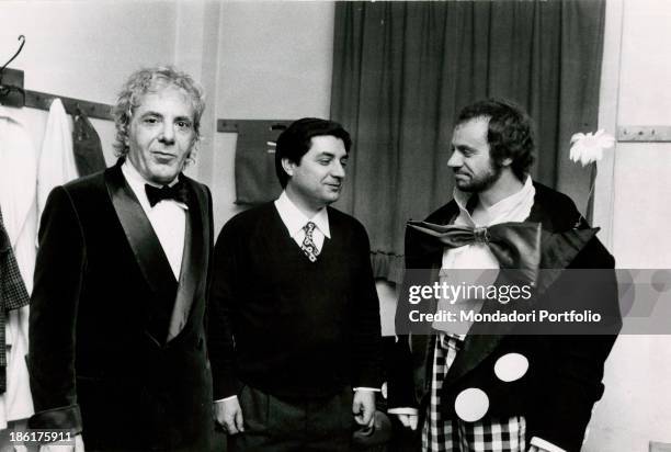 Italian singer and actor Johnny Dorelli , Italian actor Gianrico Tedeschi and Italian director Emilio Bruzzo having a break behind the scenes of the...