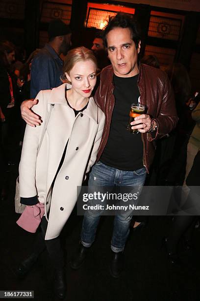 Amanda Seyfried and Yul Vazquez attend the LAByrinth Theater Company Celebrity Charades 2013 benefit gala at Capitale on October 28, 2013 in New York...