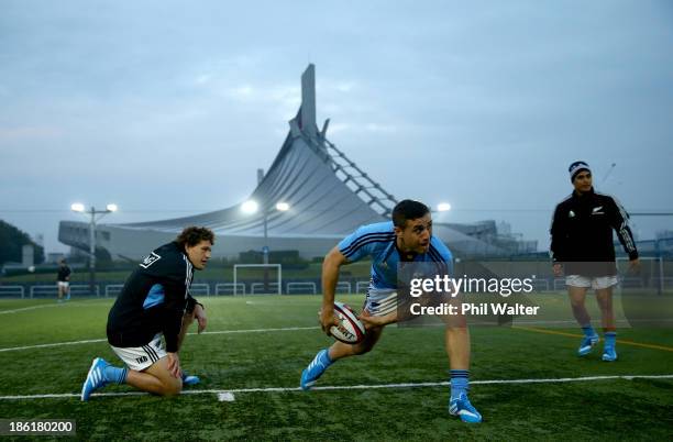 Perenara of the All Blacks passes during a New Zealand All Blacks training session at the Yoyogi Gymnasium on October 29, 2013 in Tokyo, Japan.