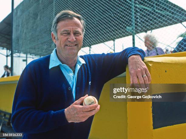 Former Major League Baseball pitcher Lew Burdette poses for a photo before a Pittsburgh Pirates spring training exhibition game at McKechnie Field in...