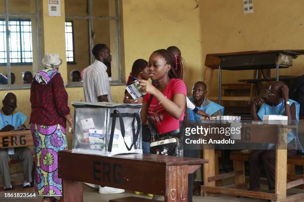 Citizens cast their votes at a polling station during presidential and general elections in Kinshasa, Democratic Republic of the Congo on December...