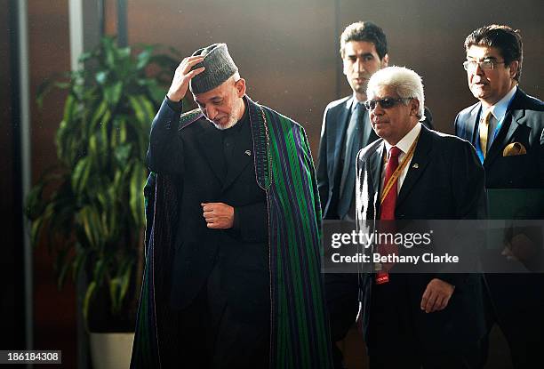 Hamid Karzai, President of the Islamic Republic of Afghanistan arrives at the 9th World Islamic Economic Forum at ExCel on October 29, 2013 in...