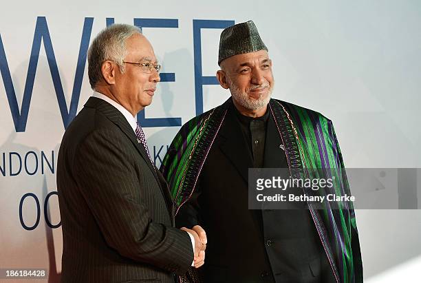 The Honourable Dato' Sri Mohd Najib Tun Abdul Razak, Prime Minister of Malaysia & Patron, WIEF Foundation greets H.E. Hamid Karzai, President of the...