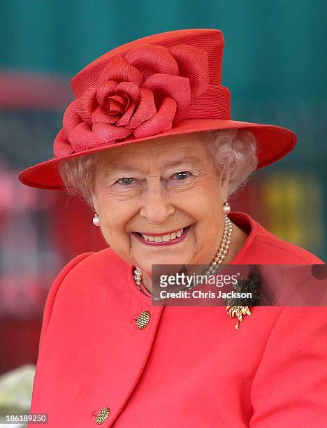Queen Elizabeth II visits Ebony Horse Club & Community Riding Centre in Brixton during a joint visit with Camilla, Duchess of Cornwall on October 29,...