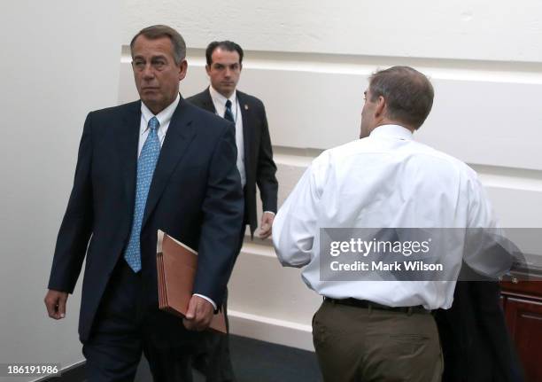 House Speaker John Boehner walks through the U.S. Capitol October 29, 2013 in Washington, DC. Speaker Boehner was headed to the weekly House...