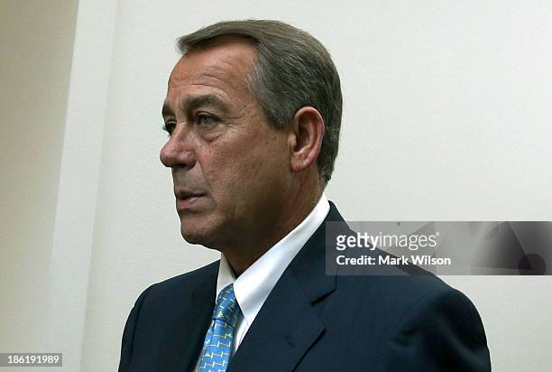 House Speaker John Boehner walks through the U.S. Capitol October 29, 2013 in Washington, DC. Speaker Boehner was headed to the weekly House...