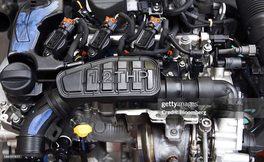 Psa Eb Engine A part-completed three cylinder EB Turbo PureTech engine, produced by ...