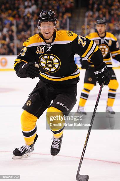 Dougie Hamilton of the Boston Bruins skates against the New Jersey Devils at the TD Garden on October 26, 2013 in Boston, Massachusetts.