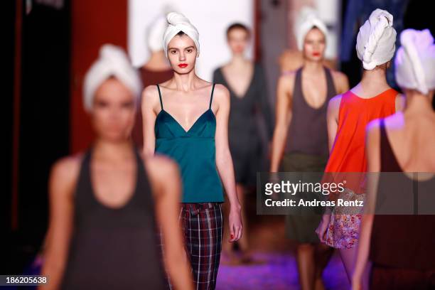 Models walk on the runway at the Maroussia Zaitseva show during Mercedes-Benz Fashion Week Russia S/S 2014 on October 29, 2013 in Moscow, Russia.