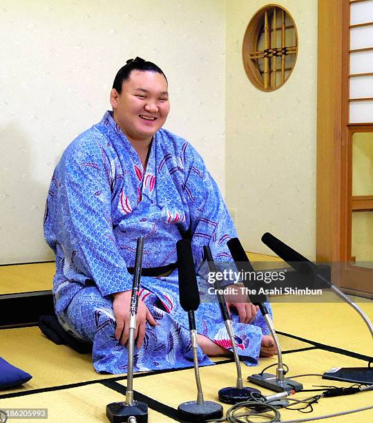 Mongolian yokozuna, sumo grand champion Hakuho, whose real name is Mnkhbatyn Davaajargal speaks during a press conference after the new ranking...