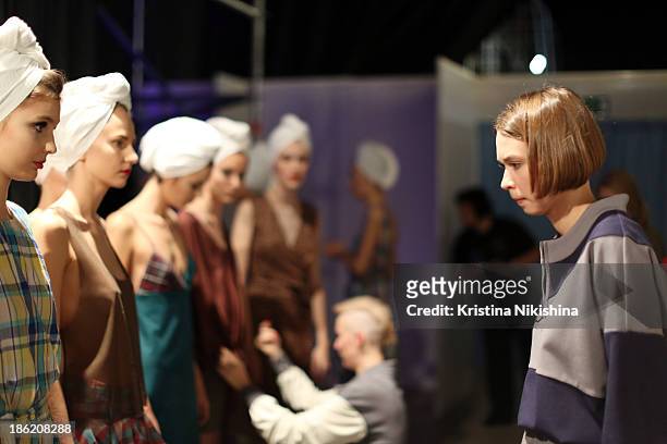 Designer Maroussia Zaitseva is seen backstage at the Maroussia Zaitseva show during Mercedes-Benz Fashion Week Russia S/S 2014 on October 29, 2013 in...