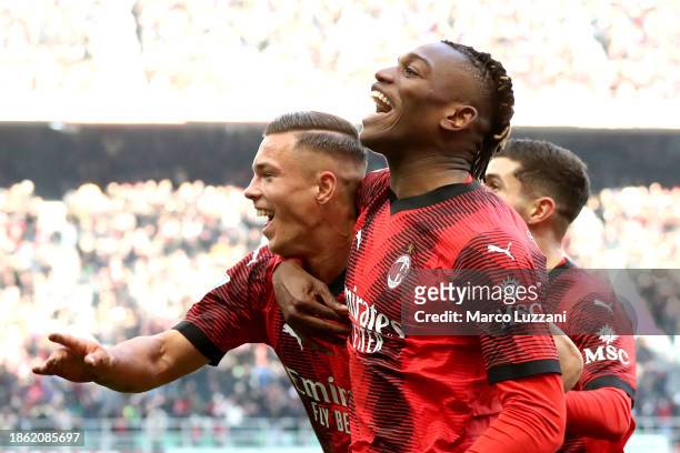 Jan-Carlo Simic of AC Milan celebrates with Rafael Leao of AC Milan after scoring their team's second goal during the Serie A TIM match between AC...