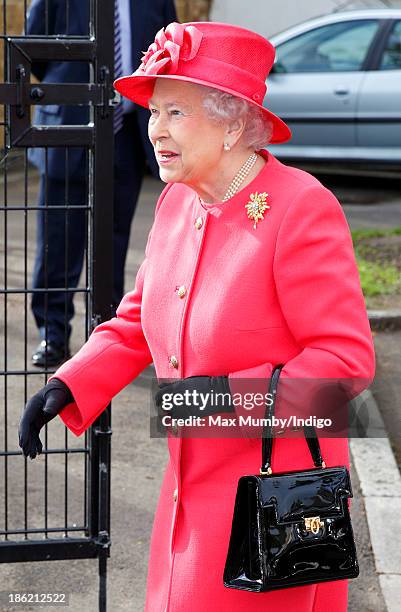 Queen Elizabeth II accompanied by Camilla, Duchess of Cornwall visits the Ebony Horse Club and Community Riding Centre on October 29, 2013 in London,...