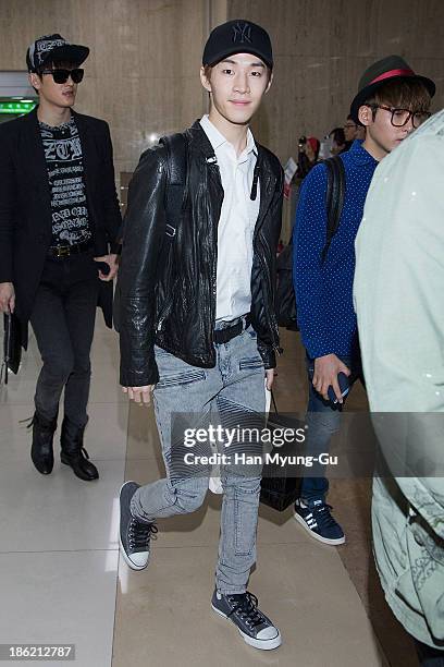 Henry of boy band Super Junior M is seen upon arrival at the Gimpo Airport on October 28, 2013 in Seoul, South Korea.