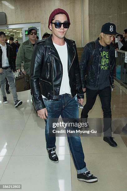 Kangin of boy band Super Junior M is seen upon arrival at the Gimpo Airport on October 28, 2013 in Seoul, South Korea.