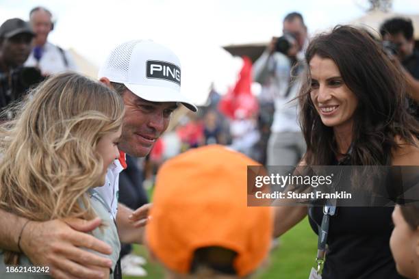 Louis Oosthuizen of South Africa celebrates victory with his wife Nel-Mare Oosthuizen and daughters on Day Four of the AfrAsia Bank Mauritius Open...