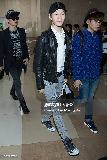 Henry of South Korean boy band Super Junior M is seen upon arrival at the Gimpo Airport on October 28, 2013 in Seoul, South Korea.