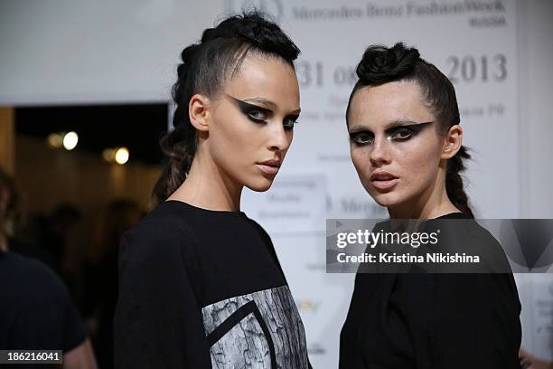 Models are seen backstage at the The Muscovites By Masha Kravtsova show during Mercedes-Benz Fashion Week Russia S/S 2014 on October 29, 2013 in...