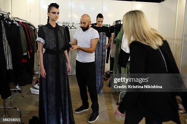 Designer Masha Kravtsova is seen backstage at the The Muscovites By Masha Kravtsova show during Mercedes-Benz Fashion Week Russia S/S 2014 on October...