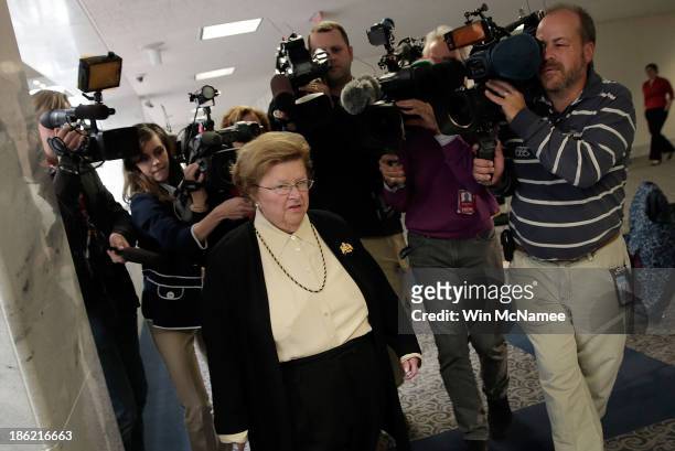 Sen. Barbara Mikulski is trailed by reporters while arriving for a markup of the Senate Select Committee on Intelligence October 29, 2013 in...