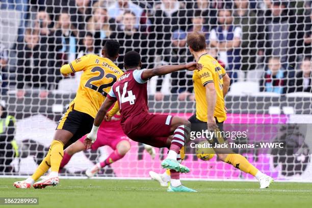 Mohammed Kudus of West Ham United scores their team's first goal during the Premier League match between West Ham United and Wolverhampton Wanderers...