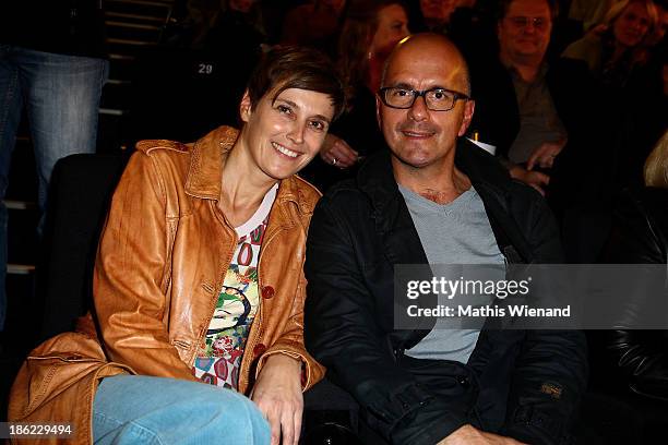 Christoph Maria Herbst and his wife Gisi Herbst attend the premiere of "King Ping" at Cinemaxx Wuppertal on October 29, 2013 in Wuppertal, Germany.