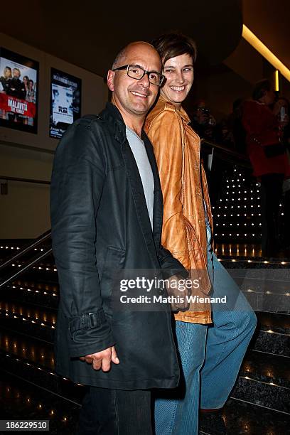 Christoph Maria Herbst and his wife Gisi Herbst attend the premiere of "King Ping" at Cinemaxx Wuppertal on October 29, 2013 in Wuppertal, Germany.