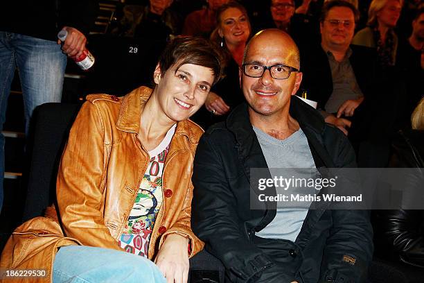 Christoph Maria Herbst and his wife Gisi Herbst attend the premiere of "King Ping" at Cinemaxx Wuppertal on October 29, 2013 in Wuppertal, Germany.