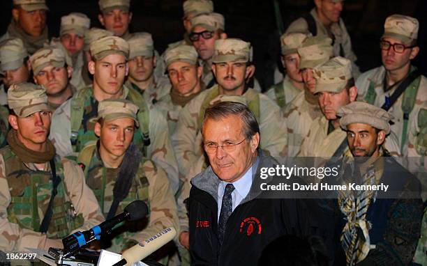 Secretary of Defense Donald Rumsfeld addresses members of the 10th Mountain Division December 16, 2003 at Baghram Air Base in Afghanistan.