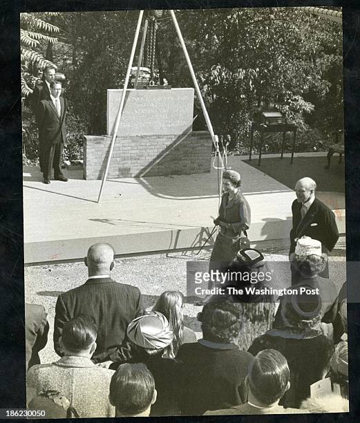 After placing the cornerstone for the new British Embassy, Queen Elizabeth II leaves with British Ambassador Sir Harold Caccia in Washington, DC on...
